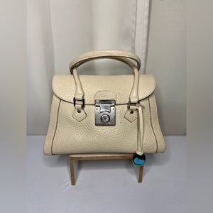 Dooney and Bourke vintage ivory pebbled leather satchel bag
